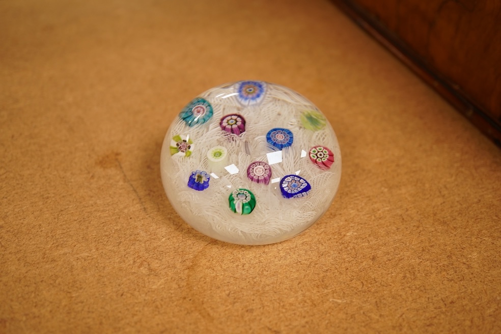 A Perthshire millefiori paperweight, 6.5cm in diameter, together with related Sotheby’s catalogues
